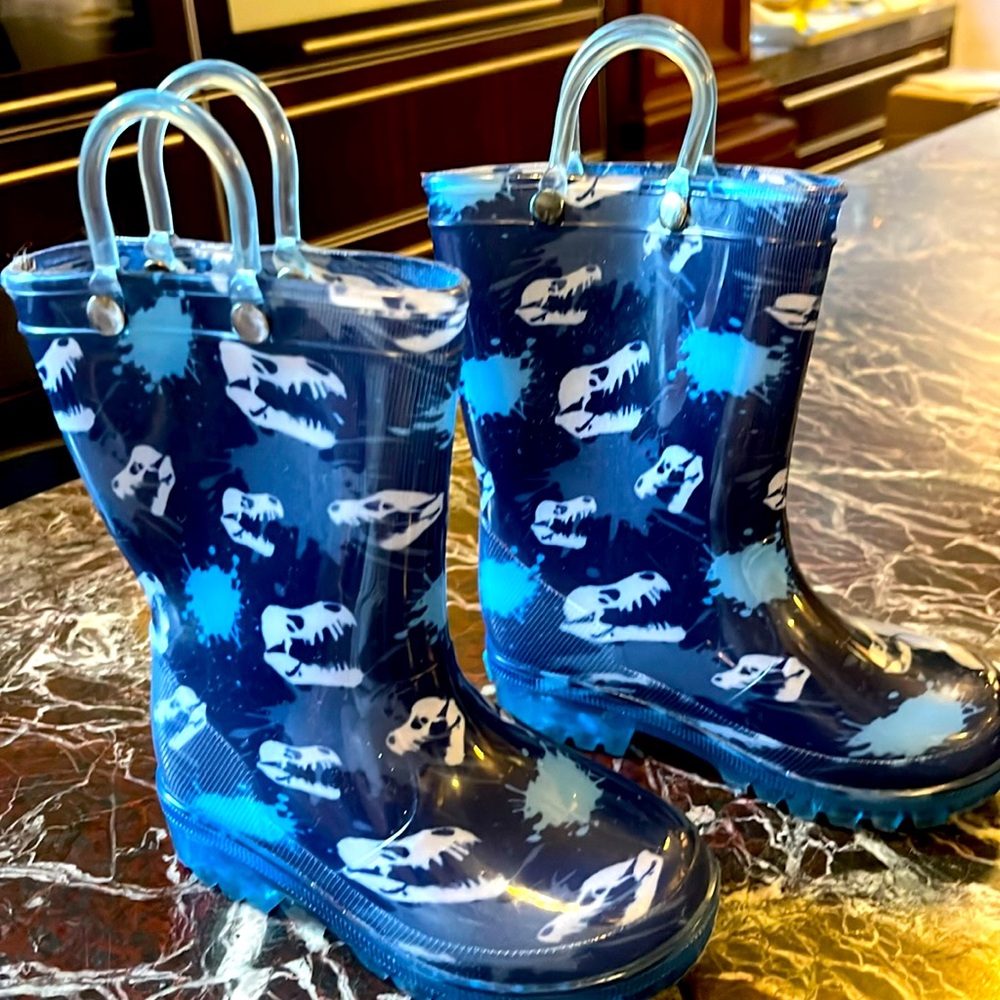 Grandson grew out rain boots use maybe once